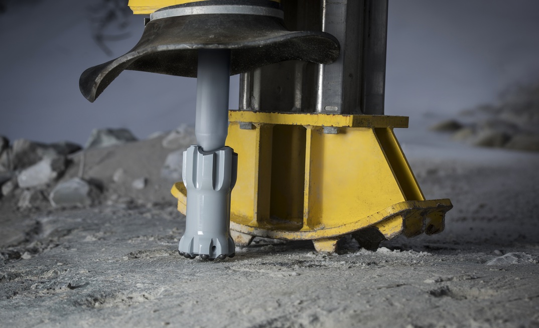  Epiroc’s new Grey line top hammer bit mounted on a rig