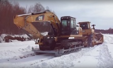 Equipment moving up the ice road to site in March 2016