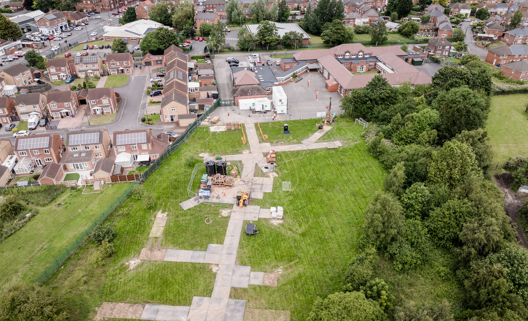An aerial shot of the borehole drilling at Marshland Primary Academy for ground source heat pump installation by Kensa