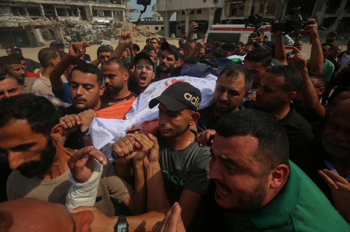 Gazans mourn journalists killed in Israeli strike as heavy bombardment continues