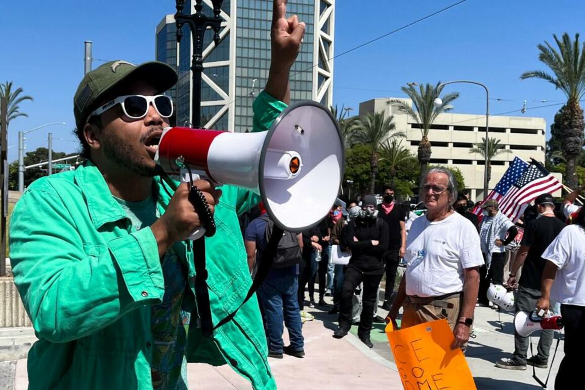 Protesters gather at Santa Ana federal building- This is the healthiest thing to do