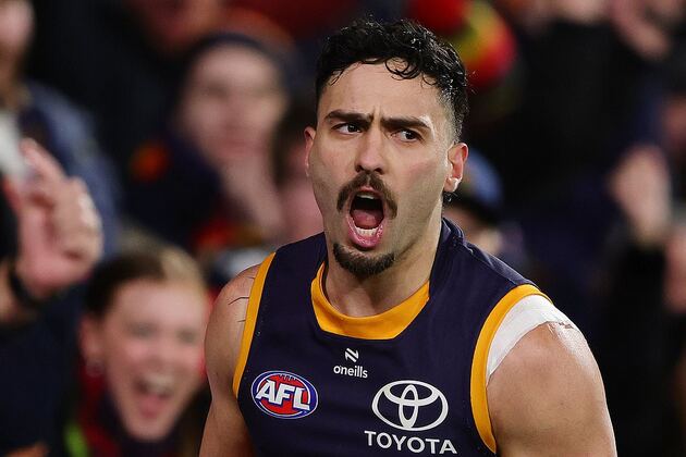 AFL star Izak Rankine leaves the country following four-match ban for homophobic slur