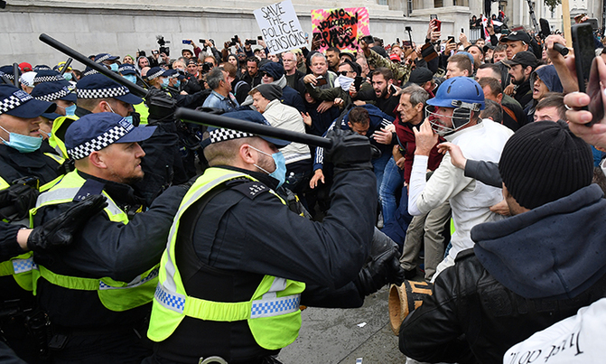 10 arrested as police break up London anti-lockdown rally 10 arrested as police break up London anti-lockdown rally