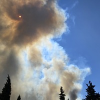 PhotoFlash | Unknown fire erupts near Syrian presidential palace