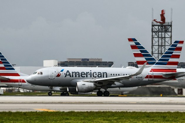 Passenger breaks into cockpit, tries to jump out of plane