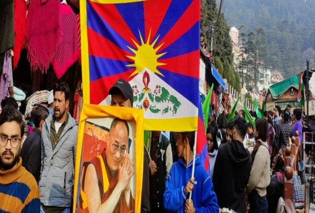 Tibetan women hold candle march to mark anniversary of 64th national uprising in Shimla