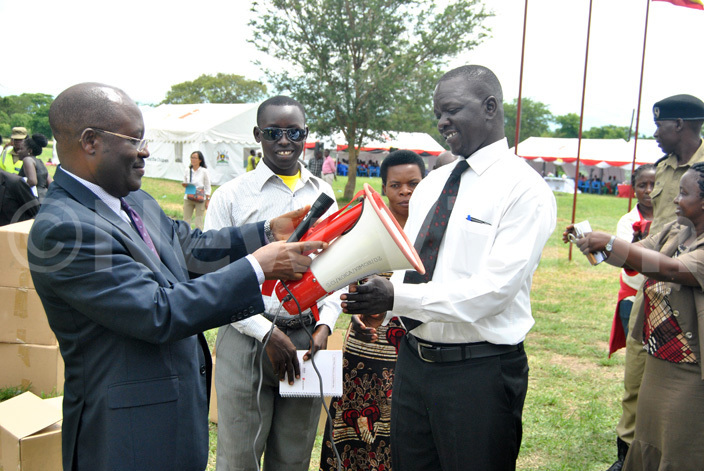  nthony bonye hands over a megaphone to azwell the  toroko district