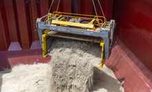 Pilbara Minerals spodumene being loaded onto a ship for export