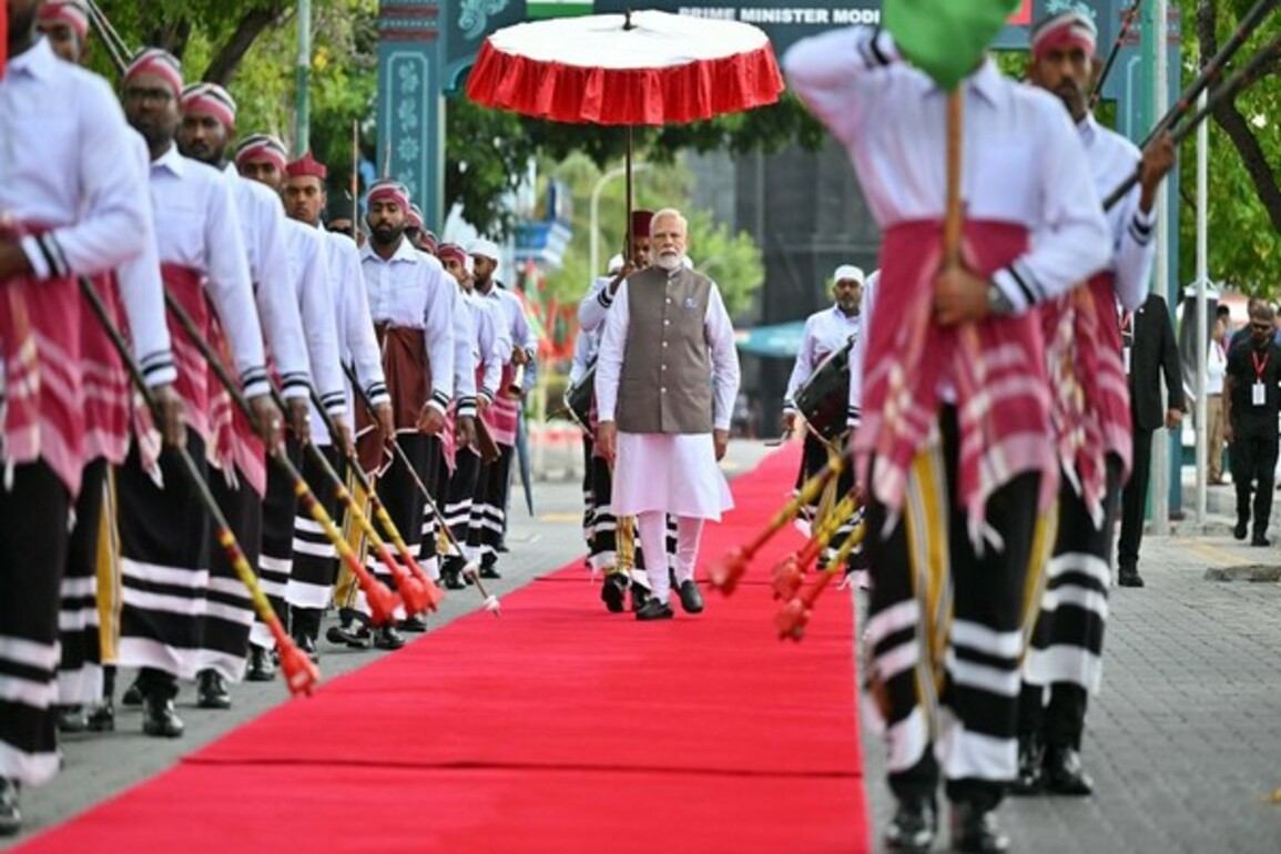 PM Modi signs guestbook, escorted to Maldives President's office with MNDF band