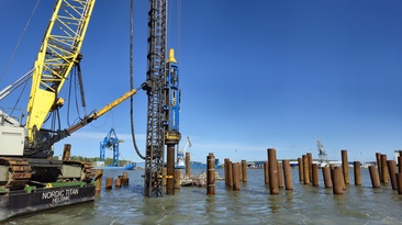 A Junttan’s HHK16S hydraulic impact hammer with Terramare’s crane attached leader installing the piles for the ferry terminal expansion in Turku
