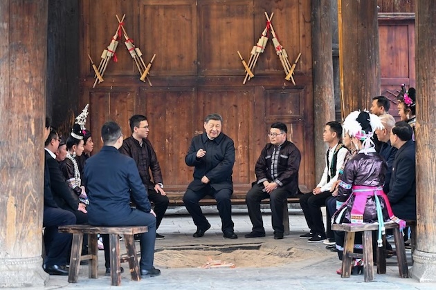 China's leader mixes it among people in  rural villages