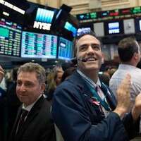 Techs rally on Wall Street, Nasdaq climbs 195 points