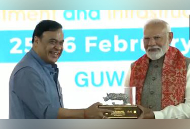 Assam CM Himanta Biswa Sarma felicitates PM Modi at Advantage Assam 2.0