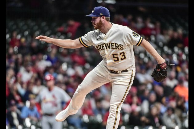 Brewers tighten wild-card race with win over Cardinals
