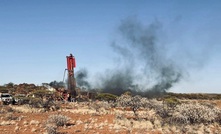  The rig producing “black smoke” from the massive sulphide interval