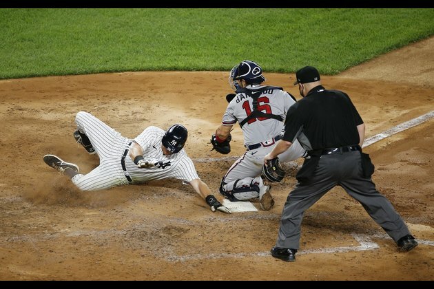 Yankees top Braves, still unbeaten at Yankee Stadium