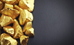 Gold weaker as base metals rise