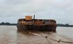 Barge MBS 78 enroute to Batu Tuhup jetty. Photo courtesy Cokal