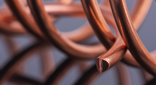 Copper eases after hitting new high