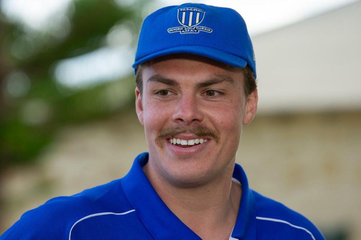 North Melbournes Cam Zurhaar receives the keys to the City of Bunbury, much to his teams amusement