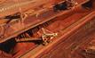 Cyclones hit BHP iron ore output