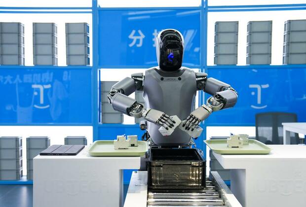 In a first, humanoid robots work as team in Chinese auto factory