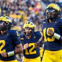 No. 15 Michigan visits No. 18 Oklahoma in rare blueblood clash