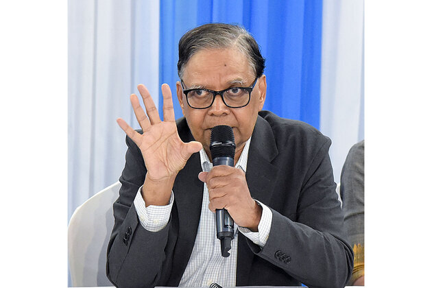 Rs 100/$ just a number, right moment to let rupee depreciate: Finance Commission Chairman to RBI
