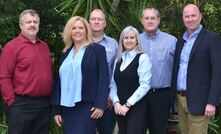 Hexagon's mining service & support director, Kobus Pienaar (left) and EMEA managing director, Andrew Crose (right) flank Trysome's Tanya Bambrough, HOD risk technologies, Gunter Haacke, COO, Lesley Bennett, chief of staff, and Eddie Smith, CEO