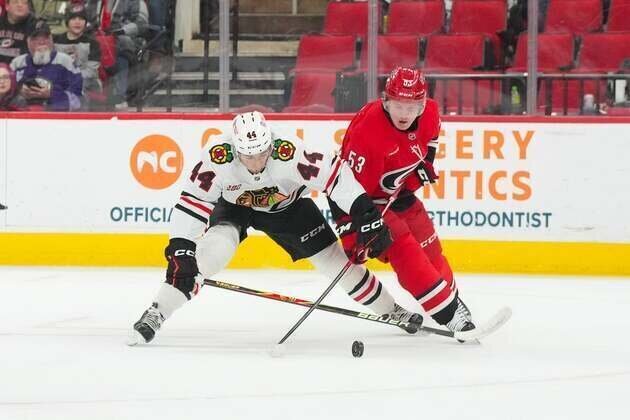Oliver Moore, Blackhawks have last laugh against Canes