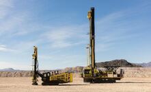 Komatsu's 44XT (left) and 77XR drills at the company's Arizona Proving Grounds.