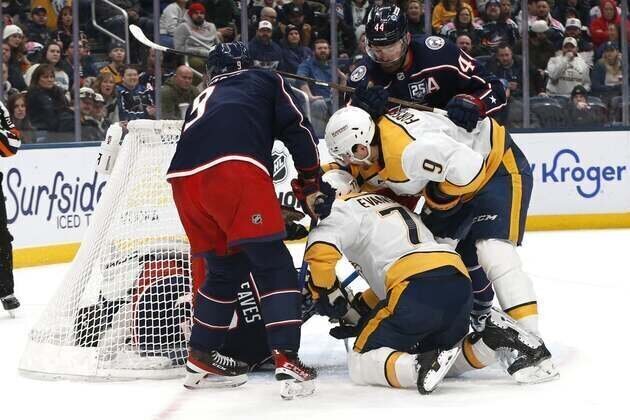 Blue Jackets score twice in third, rally past fading Predators