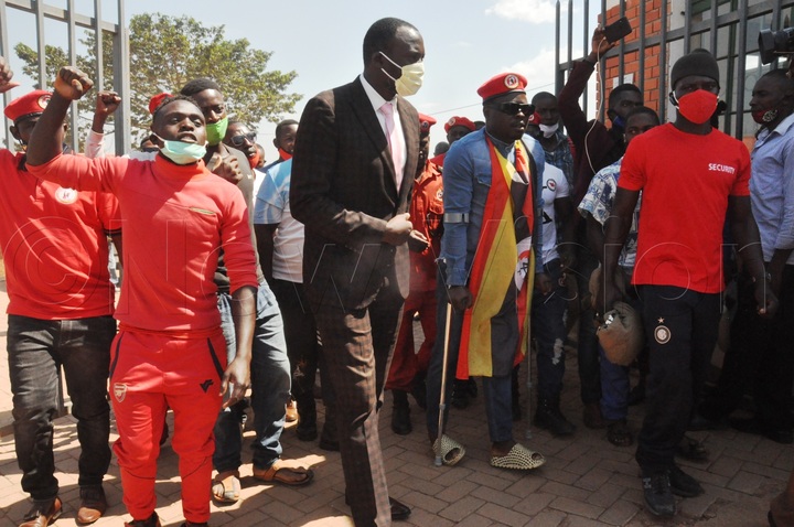 Supporters escort Zaake in Mityana after attending a court session