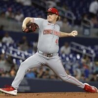 Reds avoid near-blanking, force extras to stun Marlins