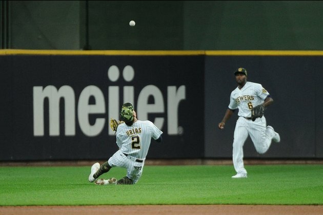 Andrew McCutchen, Luis Urias homer in Brewers' win over Nationals