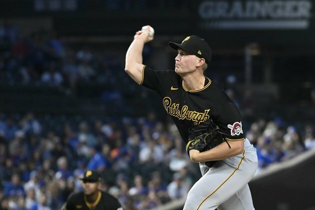 Pirates score 7 runs in 4th to roll past Cubs