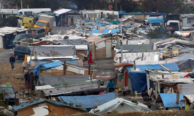 After Calais, France clears Paris migrant camp After Calais, France clears Paris migrant camp