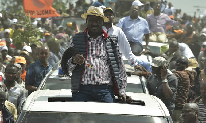 Tear gas greets returning Raila, three shot dead Tear gas greets returning Raila, three shot dead