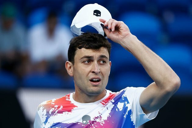 Angry Karatsev edges through in Australian Open epic
