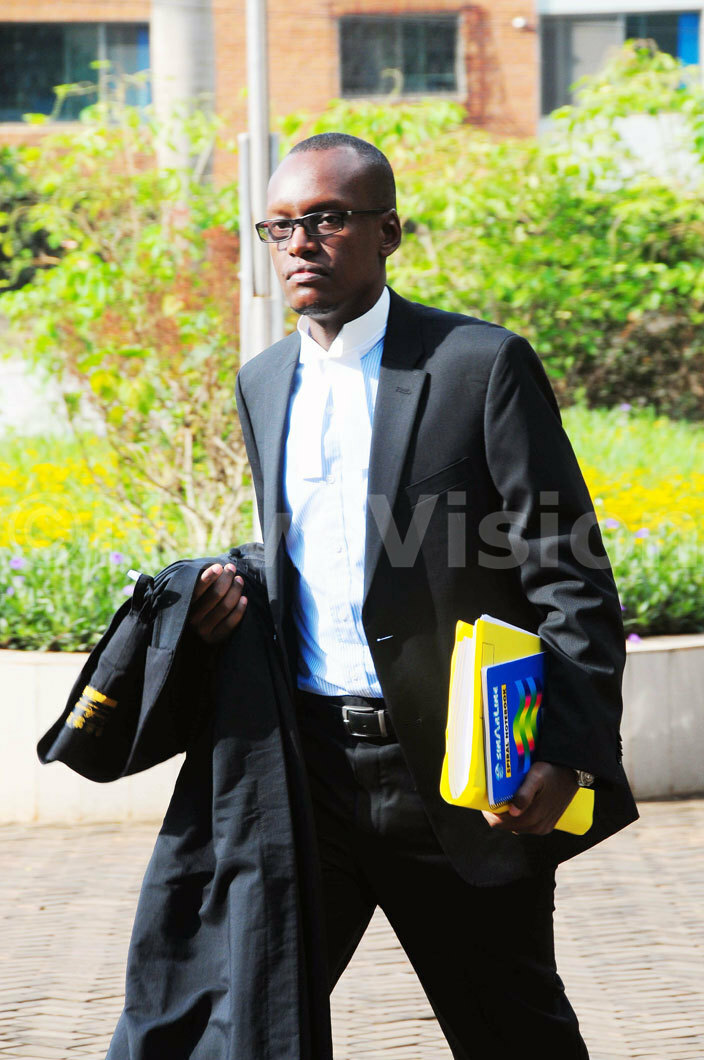 resident usevenis lawyer dwin arugire arrives at the supreme court icture by icholas neal