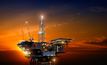 Offshore oil rig at night. Credit: Shutterstock/iurii