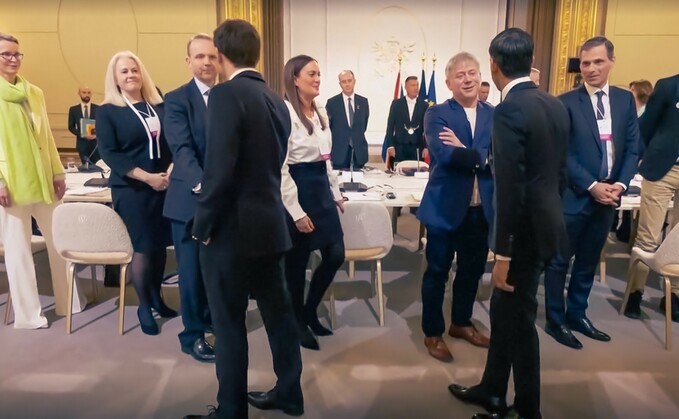 Octopus' Greg Jackson and Zoisa North-Bond with Emmanuel Macron and Rishi Sunak - Credit: Octopus Energy