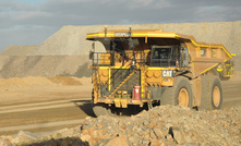 An autonomous Caterpillar 793F haul truck working.