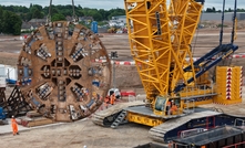 The cutterhead from HS2’s TBM Mary Ann being lifted out of the 3.5 mile tunnel it bored under Birmingham