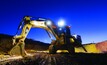 The Cat 6020B hydraulic mining shovel at night
