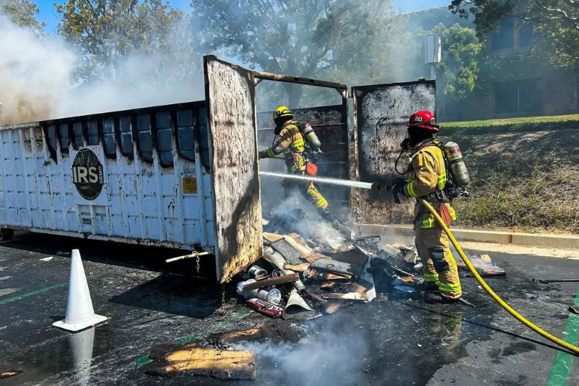 Fire crews put out an O.C. dumpster fire before it could spread to a business park - New Santa Ana