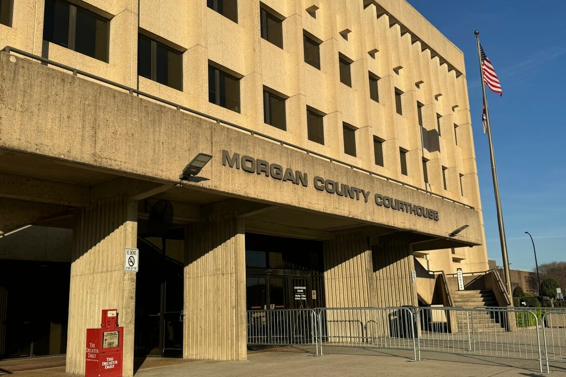 Ala. officer denied immunity for shooting armed man after he pointed gun at tow truck driver