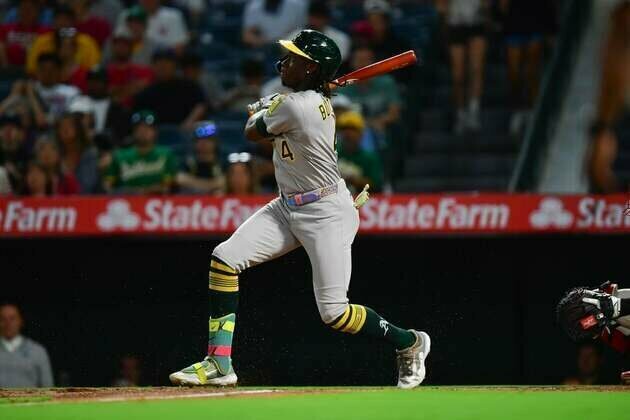 Seven-run inning propels A's past Angels