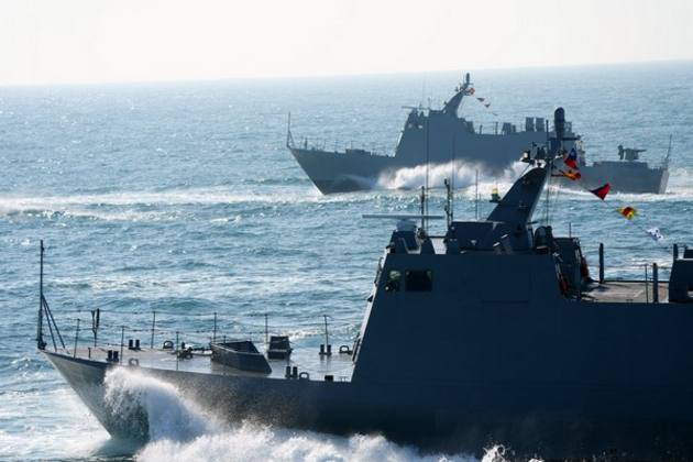 Chinese vessel runs aground near Philippine-held Island, troops on alert