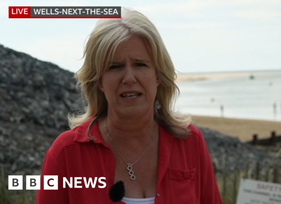 BBC TV report captures sea rescue live from beach in Norfolk